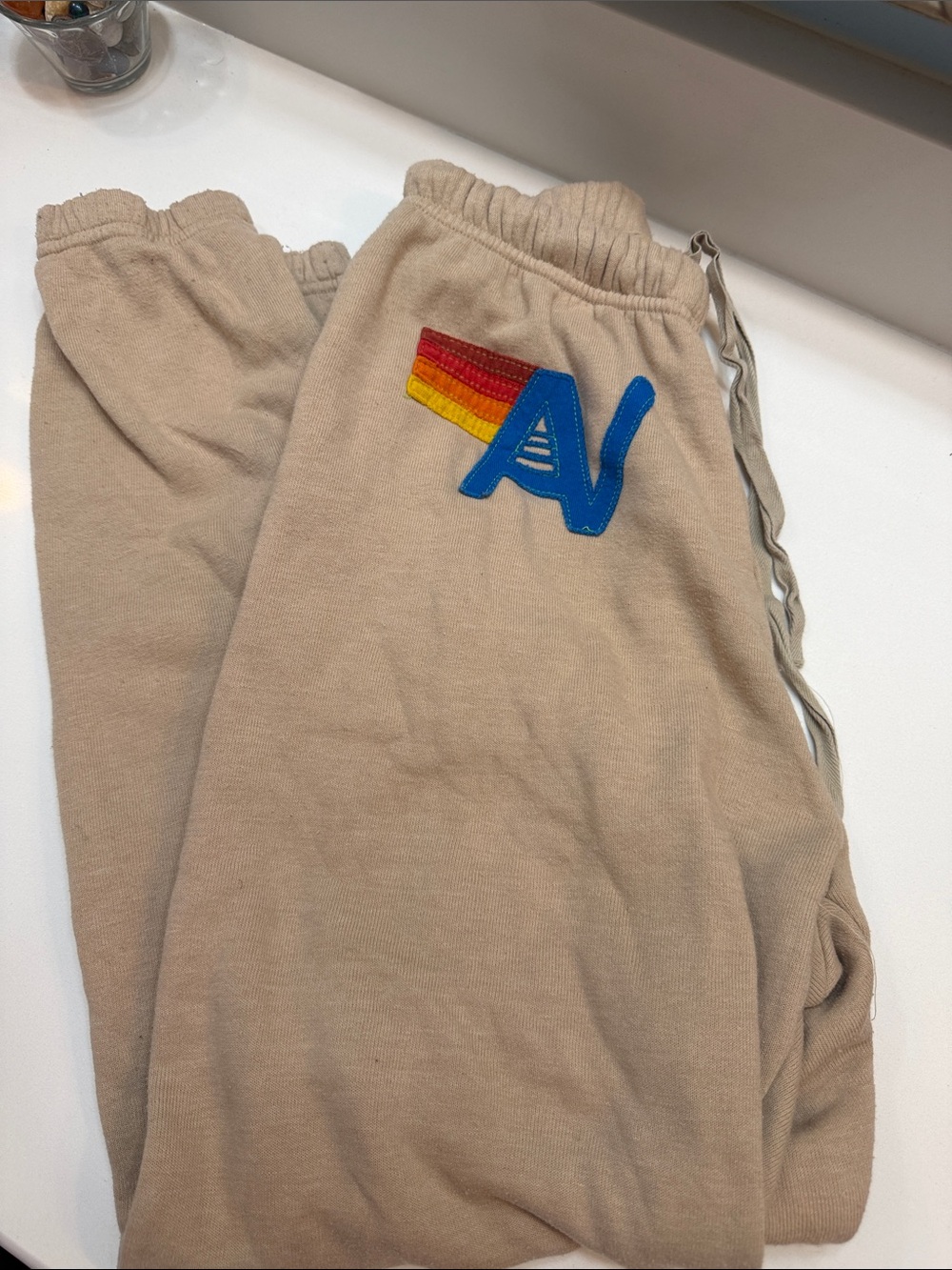 Aviator Nation Beige Joggers with Rainbow Stripe and Blue AV Patch